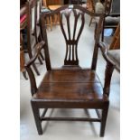 An oak Hepplewhite style carver chair; 2 dining chairs
