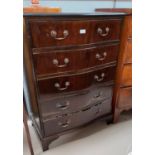 A Georgian style mahogany chest of 5 drawers with serpentine front