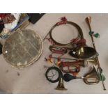 A collection of various brass and copper instruments; etc.