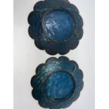 An early 20th century Japanese near matching cloisonné dishes of circular shallow lobed form, with