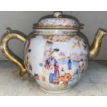 An 18th century Chinese tea pot decorated with traditional scenes and gilt highlights (some