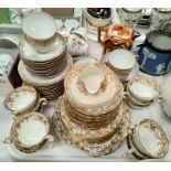A Limoges white and gilt tea service, 29 pieces; 2 Noritake cups and saucers