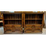 A pair of The Royal Oak Furniture Co. for Arighi Bianchi distressed oak 2 height bookcases with dou