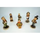 Six Goebel Hummel figures, "Little Helper"; etc.