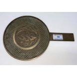 A Chinese bronze hand mirror, the back with central relief leaves against a trellis border, 4
