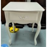 A period style double bed and bedside cabinet in cream finish