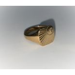 A gent's 9 carat hallmarked gold signet ring set small diamond