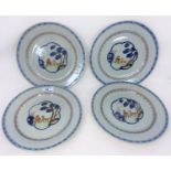 A set of 4 Chinese plates decorated with central panels decorated with deer, diameter 23cm