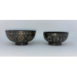 Two Bidri bowls inset with white metal, one diameter 11cm, other 9.5cm