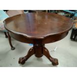 A reproduction circular coffee table