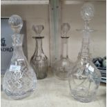 A cut glass decanter and other glassware