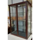 A 19th century shop table top display cabinet, all sides glazed with double doors, height 91cm,