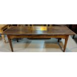 A large 19th Century countrymade oak and elm refectory dining table with figured elm plank top and