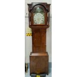 A mid 19th Century long case clock, the hood with rope twist coloumns, trunk with short door, having