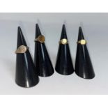 Three ladies 9 carat hallmarked gold signet rings; a 9 carat hallmarked gold ring set tiger's eye (