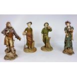 A Royal Worcester pair of figures in muted green and brown, man with an axe and woman with a bucket,