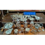 A selection of silver plate: 4 piece tea set; egg cruet; entree dish; etc.