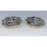 A pair pof hallmarked silver bon bon dishes of square scalloped form, Birmingham 1935 and 1936, 3.