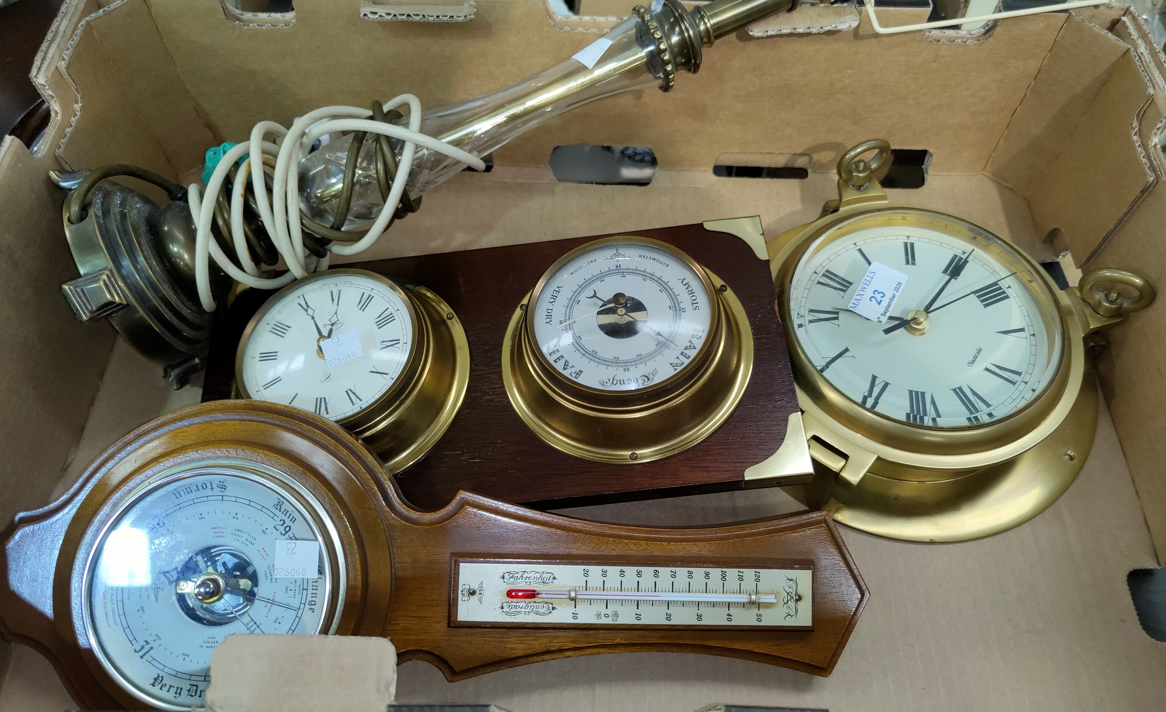 A reproduction ship's clock; a lock and barometer; metalware; bric-a-brac; etc.