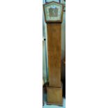 A 1930's crossbanded walnut Westminster chiming grandmother clock