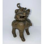 An 18th century Chinese bronze incense burner in the form of a mythical beast, height 15cm