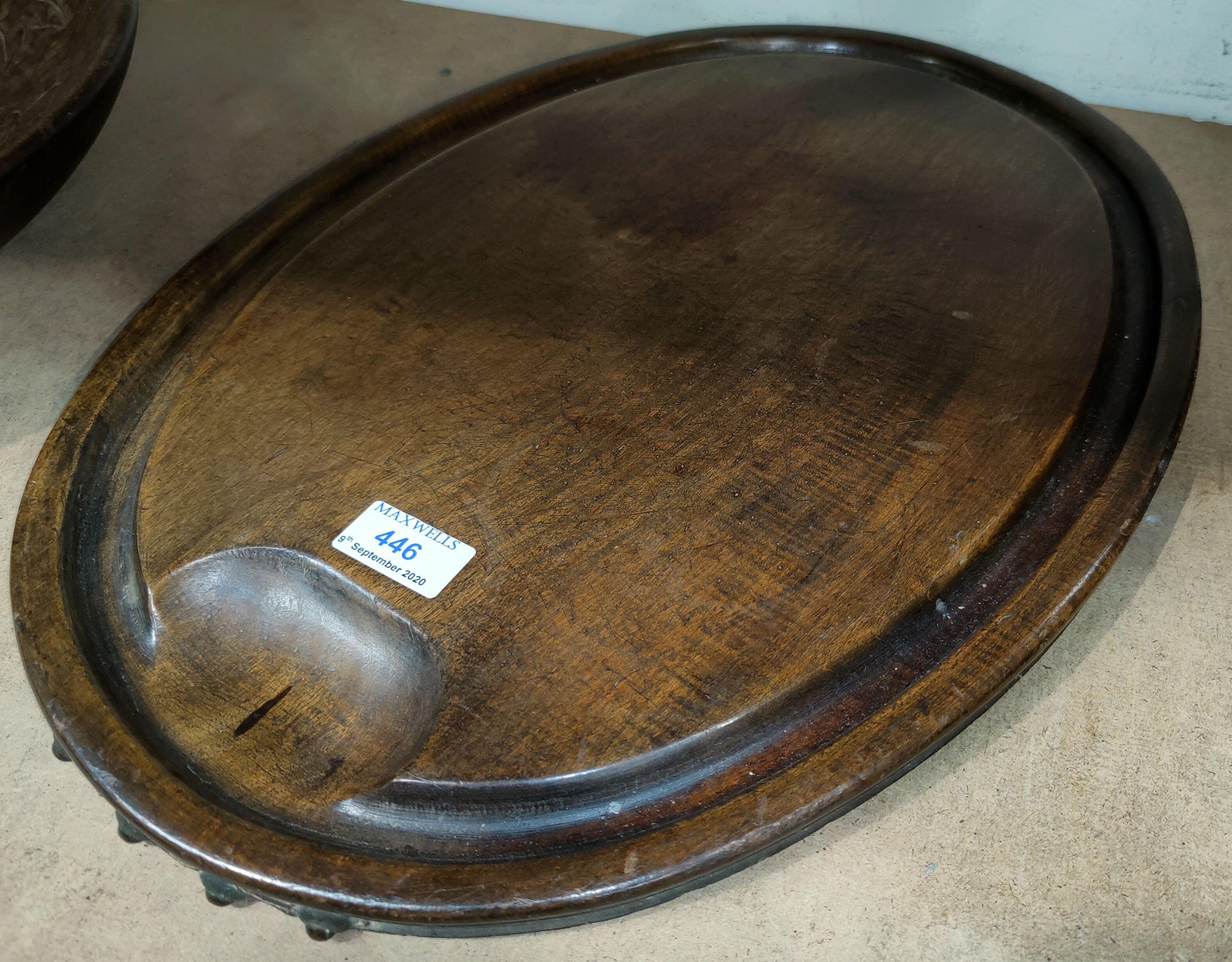 An early 19th century oval hardwood carving platter, 49cm