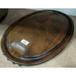 An early 19th century oval hardwood carving platter, 49cm