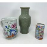 A Chinese large single handled mug, a Chinese crackle glazed vase (restored) and another vase