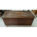 A 19th century oak bedding box