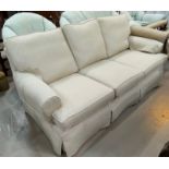 A modern cream Multiyork three seater settee