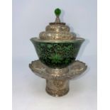 A Tibetan white metal stand and lid with green and black Chinese bowl with character mark to base