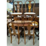 A burr walnut period style dining suite comprising extending table, 6 chairs and sideboard, on
