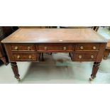 A William IV knee hole desk with inset leather top