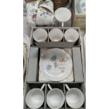 A Wedgwood "Ice Rose" set of 6 tea cups and saucers, in original box with milk and sugar; a set of 5
