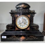 A marble cased architectural mantel clock with chiming movement stamped JJS