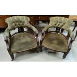 A pair of Edwardian mahogany tub chairs on turned legs with original castors