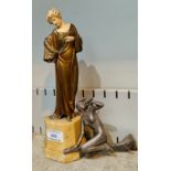 A 1930's gilded bronze and ivory figure of a woman in long classical dress, on fawn marble plinth,