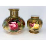 A Royal Worcester squat circular vase with pierced slender neck, hand painted with roses, H36,
