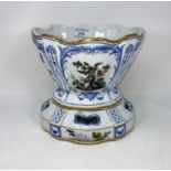 A late Meissen style vase with decorative panels of birds, on separate base