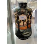 A modern Moorcroft vase of cylindrical waisted form, decorated with landscape and trees by Sian