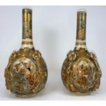 A pair of satsuma vases with ovoid bodies and slender necks, relief ropework decoration, the reserve
