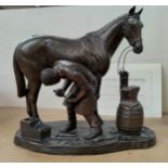 A limited edition bronzed group "The Blacksmith" by Heredities Ltd, with certificate, width 27 cm