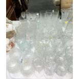 A set of 12 crystal champagne flutes; other cut drinking glasses