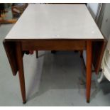 A 1960's kitchen table with drop leaf Formica top