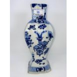 A 19th century Chinese blue and white vase, decorated with vases, etc, height 28cm (vase cut down