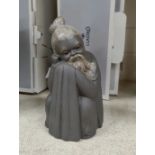 A Lladro Society bisque figure: crouching oriental monk, height 18 cm