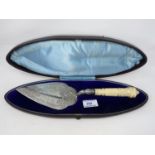 A hallmarked silver presentation trowel in original fitted box, with ivory handle, Sheffield 1883