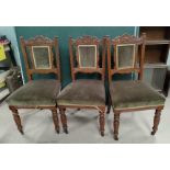 An Edwardian set of 6 dining chairs in carved oak, with brown dralon seats and backs