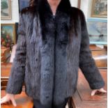 A ladies dark brown mink short coat