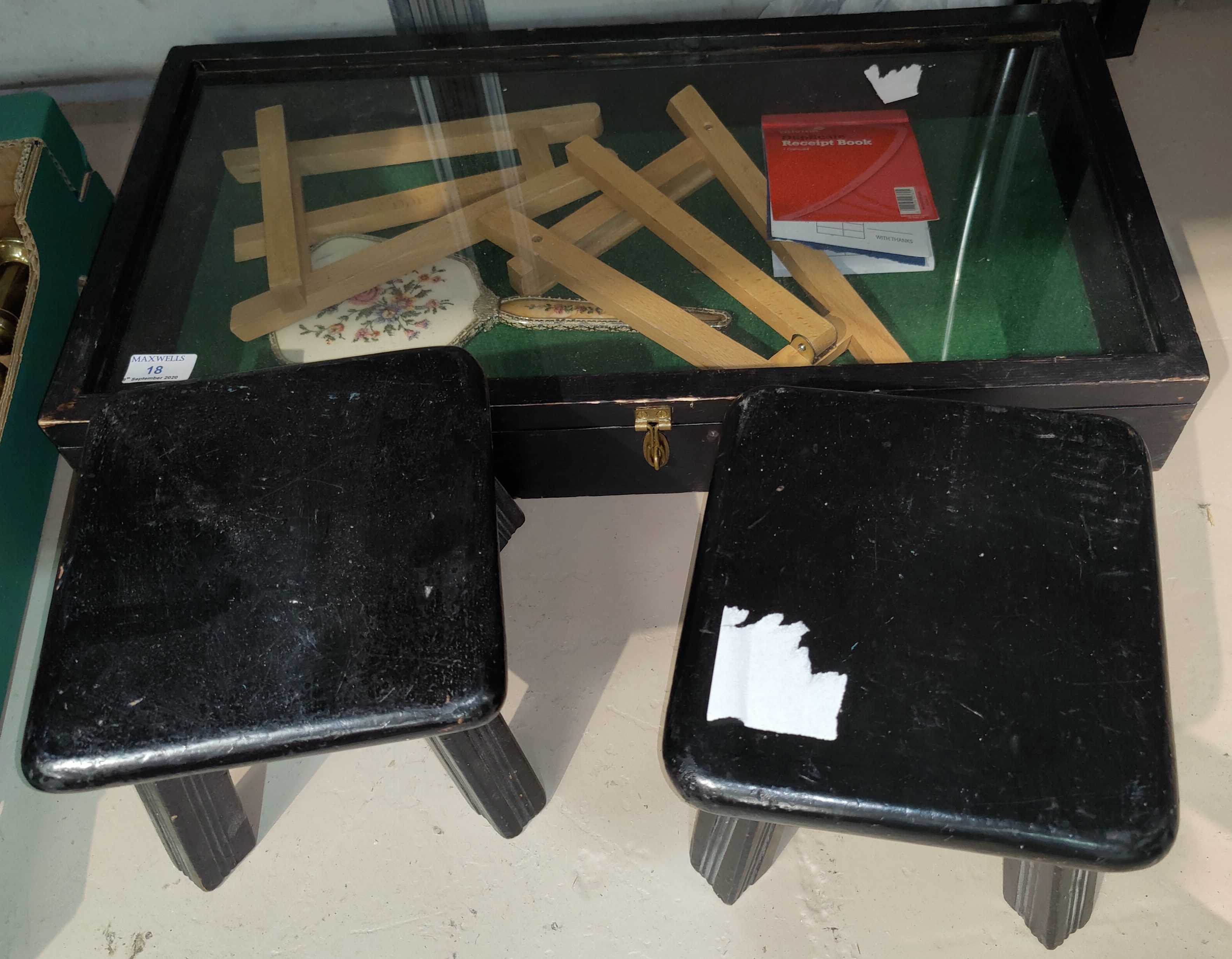 A table top display cabinet with hinged lid; 2 small stools; etc.